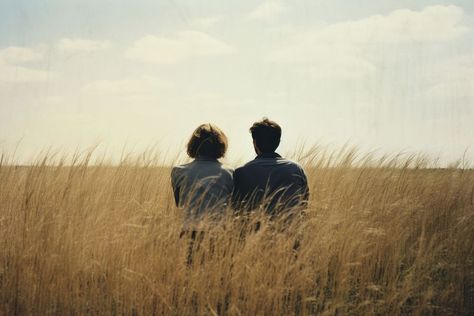 A far away couple sitting on top a grass covered field photography landscape outdoors. AI generated Image by rawpixel. | free image by rawpixel.com / Boom Couple Talking To Each Other Aesthetic, Friends In A Field, Outdoor Couple Photography, Couple In Field, Prewed Concept, Couple Landscape, Adult Aesthetic, Outdoor Couples Photography, Divine Rivals