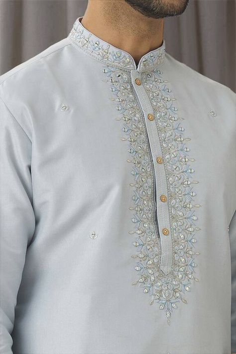 Sky blue kurta with thread embroidered floral motifs embellished by mirrorwork. Comes with pant. - Aza Fashions Stylish Men Wear, Blue Kurta, Men Kurta, Kurta Men, Mens Kurta Designs, Simple Kurta Designs, Embroidery Neck Designs, Kurta With Pants, Kurta Designs