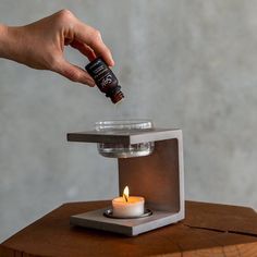 Saje Natural Wellness on Instagram: “Meet the Elements Studio diffuser – a limited-edition, heat-powered diffuser. ⁠⠀ ⁠⠀ Cement your wellness with this sleek diffuser, perfect…” Rocks For Garden, Cement Design, Cement Candle, Candle Crafts Diy, Concrete Diy Projects, Cement Art, Concrete Candle, Concrete Furniture, Concrete Crafts