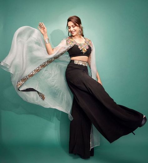 Introducing latest Bridal & Bridesmaids oufits ideas ft. Madhuri Dixit. From designer lehenga design to stylish designer sarees, ,we have got amazing designs for all. #shaadisaga #indianwedding #madhuridixitdancedeewaneoutfits #madhuridixitoutfitsdesignersarees #madhuridixitlehengaindianweddings #madhuridixitsuits #madhuridixitdancedeewaneoutfitslatest #madhuridixitdressesfashionstyle #madhuridixitlehenga #madhuridixitsarees #madhuridixitblacksaree #madhuridixitbluelehenga #madhuridixitredsaree Trendy Outfits Indian, Indo Western Dress, Madhuri Dixit, Indian Wedding Outfits, Indian Designer Outfits, Indo Western, Fashion Attire, Indian Fashion Dresses, Designer Dresses Indian