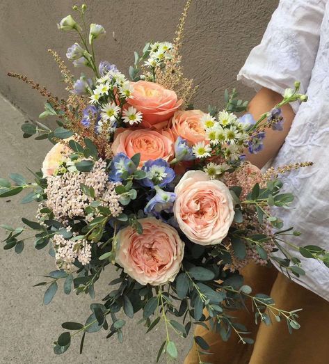 Peach And Navy Wedding Flowers, Coral And Blue Flower Arrangements, Coral Blue Purple Wedding, Blue Peach Flowers, Blue And Peach Floral Arrangements, Blue Peach Bouquet, Peach Pink Blue Wedding, Purple Blue And Peach Wedding, Blue And Coral Bouquet