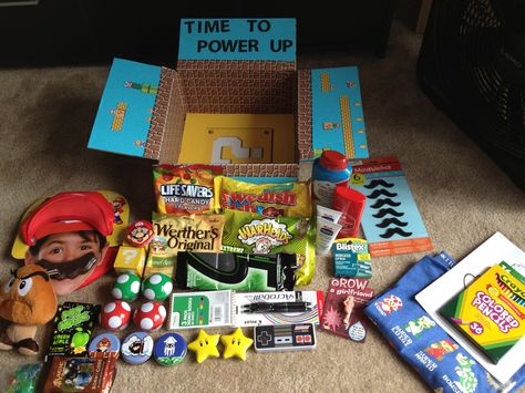 Mario Bros themed halfway box I made for my husband Mario Care Package, Deployment Halfway Boxes, Werthers Original, Family Box, Deployment Care Packages, Mario Bros Birthday, Navy Life, Birthday Hampers, Care Packages