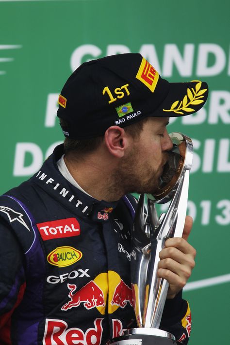 2013 Brazilian Grand Prix  Sebastian Vettel kisses his trophy. Brazil Grand Prix, Brazilian Grand Prix, F1 Wallpaper, Red Bull F1, Ferrari Scuderia, F1 Wallpaper Hd, Last Ride, Sebastian Vettel, Red Bull Racing