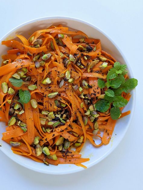 A close up of a bowl of our Moroccan carrot salad topped with fresh mint. Veg Salad Recipes, Moroccan Carrot, Moroccan Carrot Salad, Moroccan Carrots, Cilantro Salad, Moroccan Salad, Carrot Salad Recipes, Baked Bbq Chicken, Homemade Coleslaw