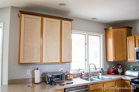 Changing Cabinet Door Fronts, Reverse Cabinet Doors, Recessed Panel Kitchen Cabinets, Changing Out Cabinet Doors, Cabinet Doors Different Color Than Frame, Cathedral Cabinet Doors Makeover, How To Replace Cabinet Doors, Ikea Cabinet Doors On Old Cabinets, Reversing Cabinet Doors