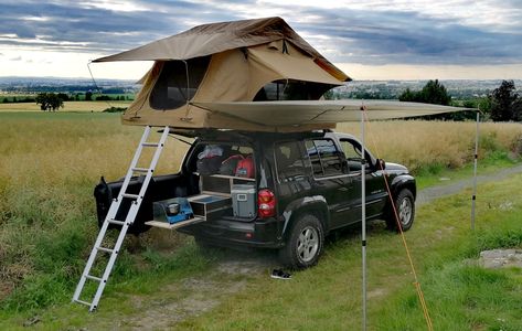 Jeep Liberty KJ Tepui Tent Roof Tent Side awning DIY Jeep Liberty Mods, Custom Jeep Liberty, Jeep Liberty Accessories, Awning Diy, Jeep Liberty Camping, Car Top Tent, Jeep Tent Roofs, Jeep Roof Top Tent, Jeep Liberty Lifted