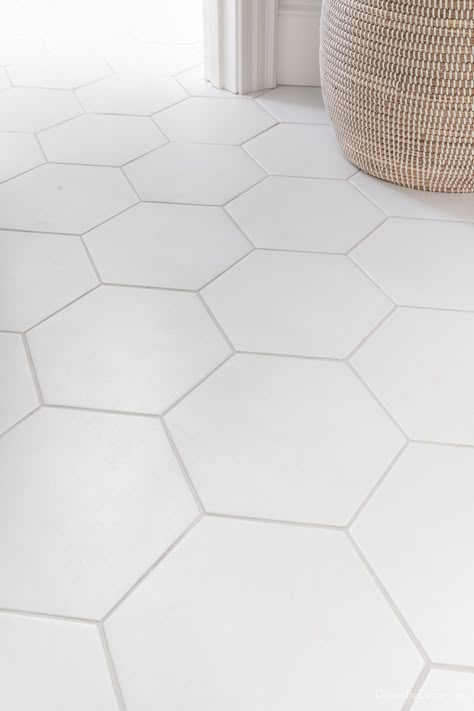 Large white hexagon tile on bathroom floor Large White Hexagon Tile Bathroom, White Hexagon Tile Bathroom Floor, White Hexagon Tile Floor, Jack And Jill Bathroom Remodel, White Hexagon Floor, White Tile Bathroom Floor, Hex Tiles Bathroom, White Hexagon Tile Bathroom, Large Hexagon Tile