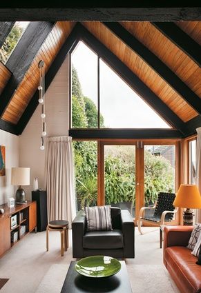 Plank Ceiling With Beams, Yurt House, Lilypad Pond, Dark Ceilings, Hill Architecture, Ceiling With Beams, Triangular Windows, Black Beams, Stahl House