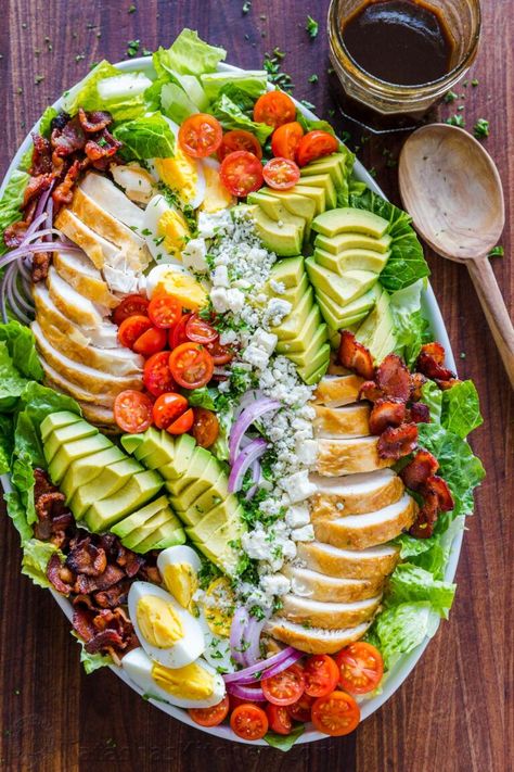 Easy Chicken Cobb Salad with the Best Cobb Salad Dressing! A protein-packed salad loaded with crisp lettuce, tomatoes, chicken, avocado and blue cheese. #cobbsalad #cobbsaladrecipe #easycobbsalad #bestcobbsalad #saladrecipes #salad #natashaskitchen Salad Cobb, Cobb Salad Dressing, Cobb Salad Ingredients, Chicken Cobb Salad, 7 Layer Salad, Homemade Balsamic Vinaigrette, Cobb Salad Recipe, Salad With Chicken, Resep Salad