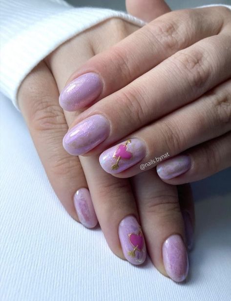 Looking for some Valentine's Day nail art ideas to try this year? From heart-shaped designs to cupid's bow and arrow, you'll love these. #valentinesday #nails #nailart Nail Designs 2022, Arrow Nails, Flame Nail Art, Bow Nail Art, Cupid's Bow, Black Coffin Nails, Manicure Nail Designs, February Nails, Cupids Bow