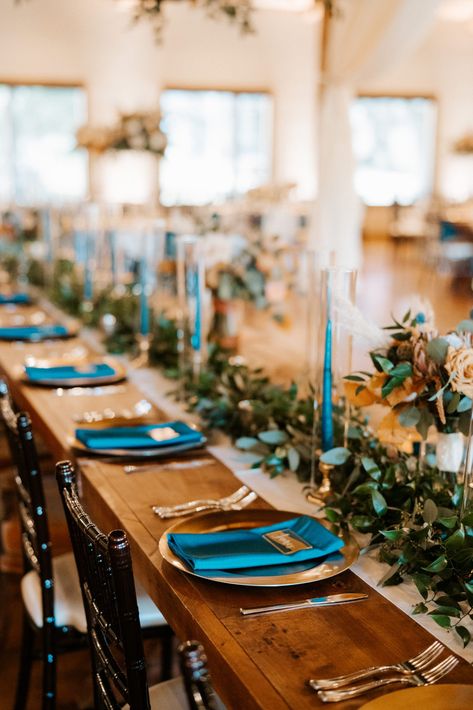 Romantic Winter Wedding at The Chandelier of Gruene | Reiley + Rose | Central Texas Floral Designer | New Braunfels, TX Wedding | chapel wedding, bride and groom, wedding, wedding day inspiration, wedding floral inspiration, romantic wedding, jewel-toned wedding colors, Hill Country wedding venue, rust wedding colors, teal wedding colors | via reileyandrose.com Teal Terracotta Wedding, Teal And Rust Wedding Centerpieces, Teal Western Wedding, Teal And Bronze Wedding, Western Wedding Blue, Dark Teal And Rust Orange Wedding Table Decor, Terracotta And Teal Wedding, Rustic Teal Wedding Decor, Teal And Rust Wedding Table Decor