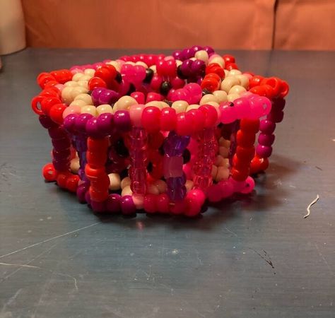 Pink, red & tan carousel cuff, and purple, pink, & black carousel cuff. Both over 2 inches in height, 1.5 inches thick, and fits about 6 inch or smaller wrist. Kandi Cuff, Rose Rouge, Carousel, Pink Red, Pink Black, Cuff Bracelet, Violet, Jewelry Bracelets, Beaded Bracelets