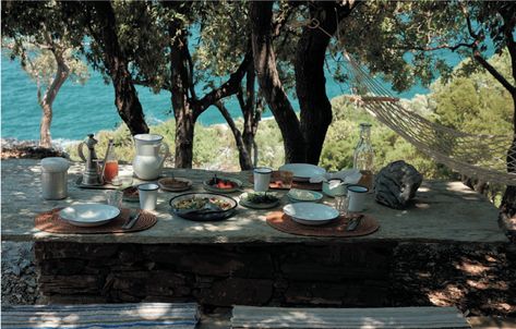 A rustic picnic table lunch above the Greek turquoise sea Haute Bohemian, Armchair Travel, The Heir, Island Life Style, Local Gifts, Visiting Greece, Classical Architecture, Rustic Living, Elegant Homes