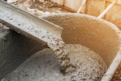 A wheel barrow with cement. Cement Work, Concrete Truck, Foil Packet Meals, Grill Oven, Mix Concrete, Foil Packets, Commercial Construction, Rock Wall, Roofing Contractors