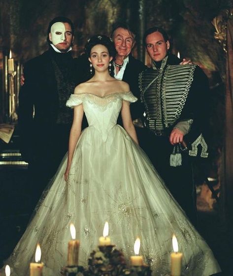 Iconic Beauties🍒 on Instagram: "Emmy Rossum, Gerard Butler, Patrick Wilson and director Joel Schumacher behind the scenes of The Phantom of the Opera, 2004🕯 #phantomoftheopera #thephantomoftheopera #emmyrossum #patrickwilson #gerardbutler #joelschumacher #iconic #beauty #icons #00s #opera #tbt #nostalgia #behindthescenes #behindthescene #onset" Opera Dress, Opera Ghost, Patrick Wilson, Emmy Rossum, Gerard Butler, The Opera, Phantom Of The Opera, Fancy Dresses, Costume Design