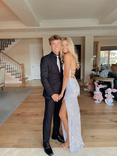 Prom Pic Ideas For Couples Cute Pictures, White Dress And Suit Couple, Prom Duo Outfits, White Iridescent Prom Dress Couple, White Prom Outfits For Couples, White Prom Dress Couple Pictures, Bf And Gf Prom Pictures, Periwinkle Prom Dress Couple, White Prom Couple Outfit