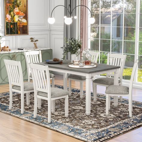 PRICES MAY VARY. Solid Wood The Neoclassical Style:This dining set includes 1 table and 6 chairs. The modelling design of this dining room table set highlights the neoclassical style. The line of table legs and chair legs is concise, pay attention to the vertical sense, overall modelling is simple, more practical. The design emphasizes the performance of the structure of the strength. The temperament of the elegant and harmonious of this table set allows the dining space brings out the open and Wooden Dining Table Set, Kitchen Table Wood, Dining Room Table Set, 7 Piece Dining Set, Dining Table Set, Dining Areas, Wooden Dining Tables, Dining Room Bar, Fabric Seat