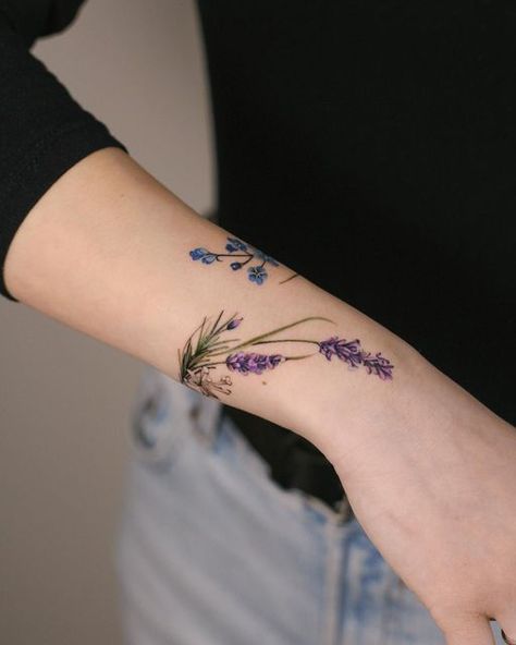 Deborah Genchi on Instagram: "Lavender, Rosemary, Forget-me-not and violet flowers bracelet 🪻 . 📍 @debrartattoos Sponsor @kurosumitattooink @electricdormouse @probodysupply . #debrartist #debrartattoos #botanicalbracelet #floralbracelet #tattoo #flowers" Purple Lavender Tattoo, Lavender Arm Band Tattoo, Delicate Lavender Tattoo, Lilac Tattoos For Women, Lavender Tattoo Leg, Herb Tattoo Ideas, Tattoo Flower Bracelet, Tattooed Bracelets, Floral Tattoo Bracelet