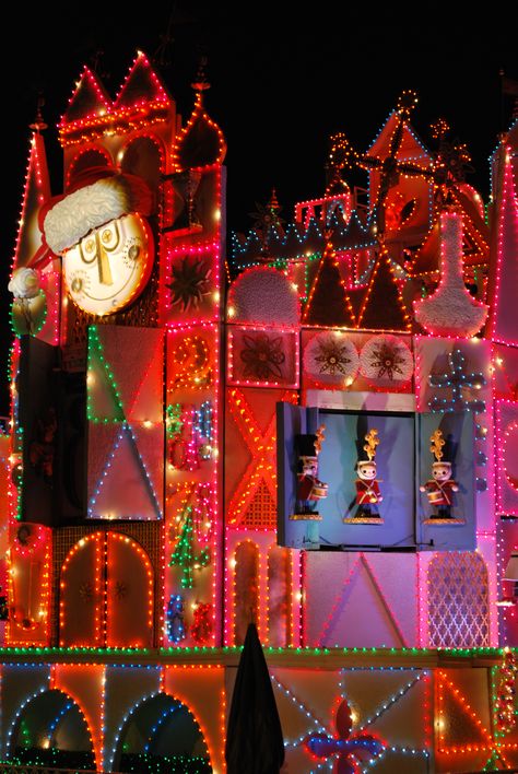 It's a Small World at Christmas in Disneyland Its A Small World Holiday, Christmas In Disneyland, Trip Manifestation, Disney Christmas Party, Its A Small World, Santa's House, Disneyland Christmas, Rainbow Christmas, Disney Photo Ideas