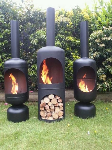 wood burning iron chiminea garden fireplace ideas fire pits Repurposed Tools, Gas Bottle Wood Burner, Homestead Crafts, Landscape Diy, Wood Burning Stoves, نباتات منزلية, Outdoor Fireplaces, Dvd Storage, Outdoor Grills