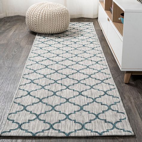 Inspired by the tile floors of Morocco, this indoor/outdoor rug adds elegant pattern to your porch, patio or sunroom. The ogee-curved trellis woven in teal adds graphic punch to a gray background. Mingled threads give this pattern a handwoven, vintage vibe that's perfect for an entry, kitchen, hallway, living room or bedroom too. The pet-friendly and kid-proof flatweave design makes it easy to clean, and perfect for the beach house. Trellis Indoor, Entry Kitchen, Teal Rug, Outdoor Runner Rug, Kitchen Hallway, Hallway Living Room, Tile Floors, Indoor Outdoor Rug, Furniture Removal