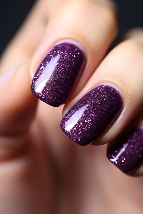 dark purple nails, glitter nail art, nail inspiration, nail design, nail ideas, nail trends, nail style, nail fashion, nail beauty, nail inspo, nail goals, nail perfection, nail magic, nail love, nail obsession, nail addiction, nail vibes, nail chic, nail elegance, nail glamour, nail sparkle, nail shine, nail statement, nail confidence Cadbury Purple Nails, Dark Purple Sparkle Nails, Sparkle Purple Nails, Purple Nails Sparkle, Dark Purple Halloween Nails, Dark Purple Nails With Glitter, Dark Purple Glitter Nails, Purple Glittery Nails, Dark Purple Nails Ideas