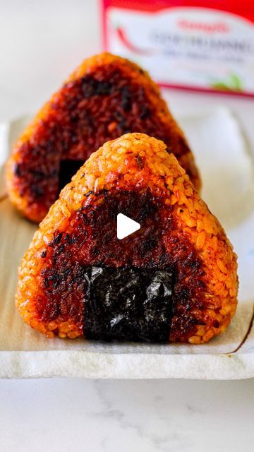 Elle 🤍 Vegan Recipes on Instagram: "Gochujang Glazed Kimchi Cheese Yaki Onigiri 🍘 She is beauty she is grace, she has CRISPY crust & melty cheesy filling, she is a sweet, spicy, and umami flavor BOMB glistening in #Sempio Gochujang 🔥  When is 1 plus 1 greater than 2? When you combine the most addicting Korean flavors with Japanese Yaki Onigiri, aka grilled rice balls. This one here is almost like a Kimchi fried rice ball stuffed with VEGAN cheese, glazed with the most LUSH Gochujang paste from #Sempio for the bold sweet, spicy, umami flavor and the vibrant color🤌🏼  Sempio is Korea’s OLDEST company for Korean condiments! I love their authentic and outstanding flavors that make seasoning so easy. Their gochujang paste is VEGAN, and has Safe Quality Food (SQF) and HACCP Certifications 💚 Korean Condiments, Grilled Rice Balls, Gochujang Paste, Yaki Onigiri, 1 Plus 1, Grilled Rice, Kimchi Fried Rice, Rice Ball, Rice Balls