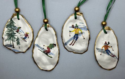 Skiers oyster shell ornaments, ski Christmas present, ski themed gifts, ski Christmas decoration, bottle tag, napkin holder by emidygreen on Etsy Ivory Paint Color, Seaside Crafts, Ski Christmas, Oyster Shell Ornaments, Bottle Tags, Shell Ornaments, Oyster Shells, Handmade Gift Wrap, Themed Gifts