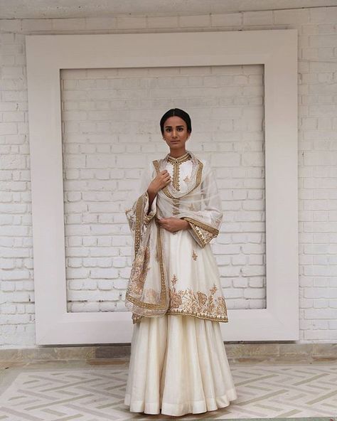 A classic piece of work by @rimple_harpreet_narula .. gold and ivory cream make a perfect melange every time .. you can't go wrong .. #lehenga #outfit #traditionL #eud #rimpleharpreet Sharara Designs, Nikkah Dress, Classy Suits, Pakistani Wedding Outfits, Desi Clothes, Indian Couture, Party Wear Indian Dresses, Indian Attire, Suit Style