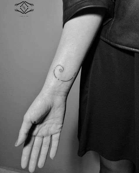 40 Amazing Fibonacci Tattoo Designs | TattooAdore Section Tattoo, Golden Spiral Tattoo, Fibonacci Spiral Tattoo, Aesthetic Geometry, Golden Ratio Tattoo, Foot Tattoo Quotes, Dr Tattoo, Yantra Tattoo, Fibonacci Tattoo