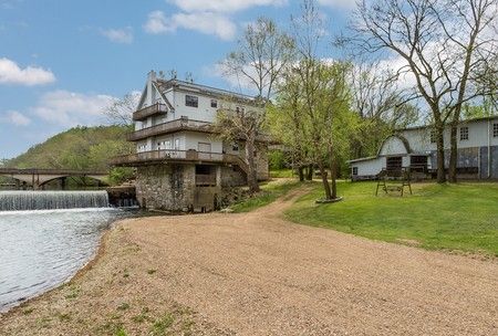 Stunning Views All Around  c. 1849 Grist Mill Ringgold, Georgia www.oldhouses.com/24077 Ringgold Georgia, Natural Gas Fireplace, Rooftop Dining, Water Turbine, Open Floor House Plans, Grist Mill, Garden Tub, Keller Williams Realty, Old Buildings