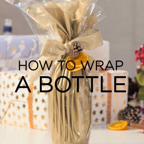 With the help from gift wrapping experts Wrapsody, here's how to create a super easy gift wrapped wine bottle for those awkward present shapes! Wrap A Wine Bottle Gift, Wrap A Wine Bottle, Gift With Flowers, Wrap A Bottle, Wine Bottles Gift Wrap, Wine Gift Wrapping, Bottle Gift Wrapping, Wine Wrap, Xmas Wrapping