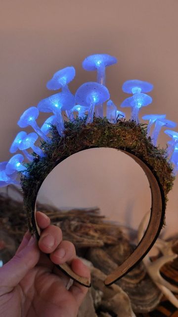 MUSHROOM QUEEN on Instagram: "Glowing mushroom fairy crown! For those might be Interested these I'm asking 60$ plus shipping! I'd be more then happy to create custom crowns as well! #mushroomartist #glowingmushroom #crown #fairycore #fairycrown #fairycosplay #mushroomfairy #mushroomlight #mushroomlights #handmadeart" Fairy Queen Cosplay, Mushroom Faerie Costume, Forest Fairy Decor, Mushroom Fae Costume, Glowing Mushrooms Diy, Mushroom Umbrella Diy, Easy Diy Mushroom Decor, Diy Fairy Crown Headpieces, Dark Forest Fairy Costume