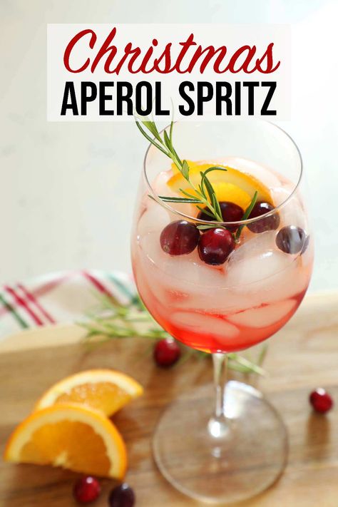 Christmas Aperol Spritz is a festive twist on the classic Aperol Spritz recipe made with cranberry. A light Christmas cocktail for a Christmas party. Cranberry Spritz, White Wine Sangria Recipe, Aperol Spritz Recipe, White Cranberry Juice, Spritz Recipe, Christmas Cocktail Party, Cranberry Juice Cocktail, Cranberry Cocktail, Classic Cocktail Recipes