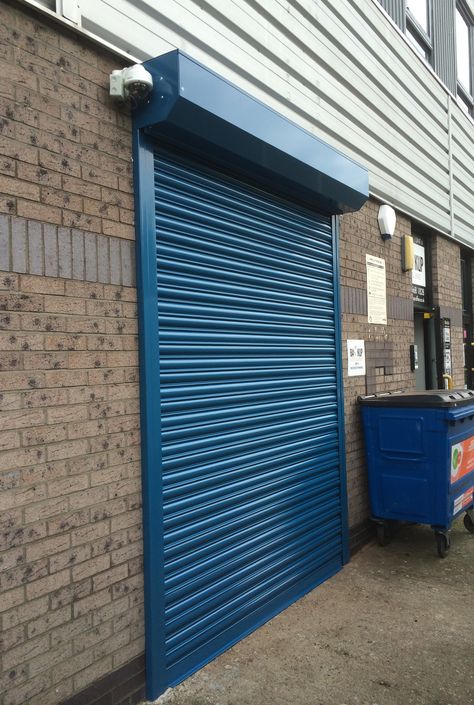 Metal Shop Door, Shop Shutter Design, Shutter Painting Ideas, Rolling Shutters Design, Roller Gate Design, Shop Shutter Painting, Roller Shutters Exterior Design, Residential Roll Up Garage Door, Metal Roll Up Garage Door