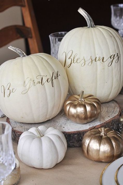 This Pumpkin Thanksgiving Table Decor will give your living room a classy feel. Use a gold Sharpie to draw letters on pumpkins for a simple, pretty centerpiece. Calligraphy Pumpkin, Thanksgiving Table Decor Ideas, Thanksgiving Dinner Table Decorations, Pumkin Decoration, Creative Pumpkin Decorating, Fall Crafting, Thanksgiving Table Decor, Pumpkin Decorations, Thanksgiving Dinner Table