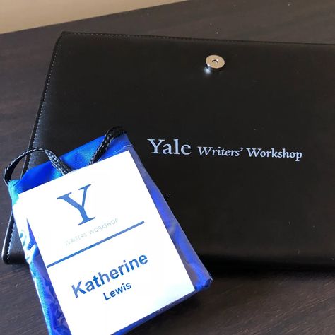 A photo of a black portfolio that says, “Yale Writers’ Workshop.” Kat’s Yale-branded conference lanyard is lying on top of it. Conference Lanyard, Black Portfolio, Writers Conference, Writers Workshop, A Writer's Life, Writer Workshop, 2024 Vision, 3 Things, Writers