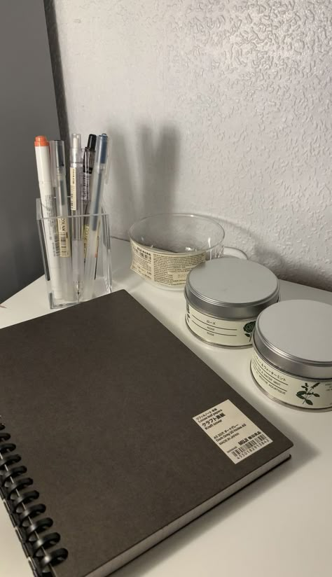 mini muji haul stock up for the winter. candles, a b5 notebook binder with refill grid paper. a glass mug and acrylic pen stand Aesthetic Binder School, Binder Notebook Aesthetic, School Binder Aesthetic, Muji Haul, Muji Aesthetic Stationary, Muji Binder, Muji Pen Aesthetic, Muji Stationary Pens, Aesthetic Binder