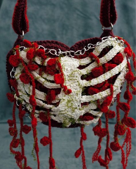 I don’t know exactly what I had in my mind when I designed this bag 🥲 I guess I wanted to add the ribcage on a heart-shaped bag and that would be it, but while I was making it I realised it was too simple!?!  Anywoo  Here’s the heart-shaped crochet bag with a ribcage design. Very demure, very mindful  #crochet #crochetaddict #crochetersofinstagram #crochetbag  Crochet, Crochet Top, Crochet Bag, Crochet Fashion, Handmade Crochet, Crochet Love, Crocheters of Instagram, Crochet Addict, Crochet Des Love Crochet Bag, Heart Bag Crochet, Mindful Crochet, Crochet Trinkets, Ribcage Design, Crochet Heart Bag, Crafting Witch, Cage Bag, Crochet Pokemon