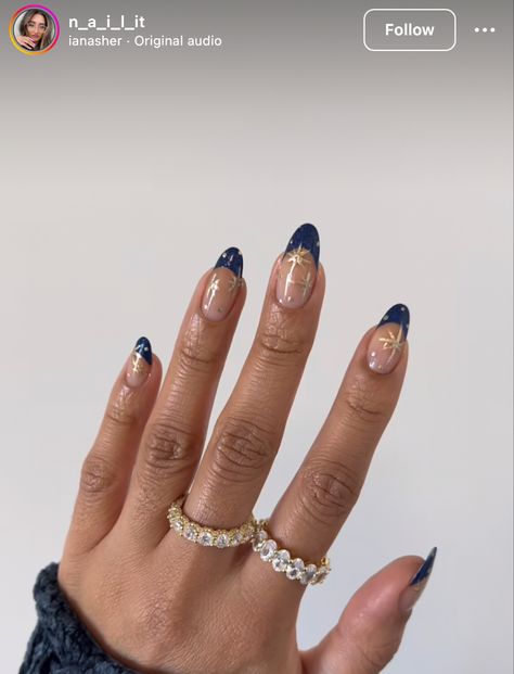 French Tip Celestial Nails, Winter Navy Nails, Navy Nails With Gold Stars, Short Navy French Tip Nails, Dark Colored Nail Designs, Navy Nail Inspiration, Navy Blue Almond Nail Designs, Navy Celestial Nails, Navy Blue And Gold Nail Ideas