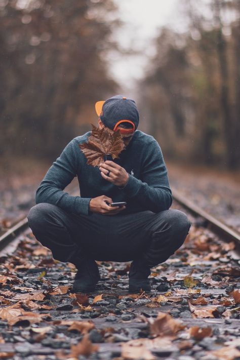 Photo of Man On Railway Train Track Poses, Railroad Photoshoot, Road Man, Train Tracks Photography, Smart Boy, Portrait Photography Men, Senior Pictures Boys, Men Photoshoot, Train Photography