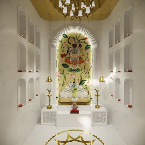 A minimalistic temple corner with elegant marble touches ✨ This mandir exudes tranquility, accentuated by a touch of grandeur and artistry. The arch frames a custom hand-painted Pichwai, with marble-carved niches on both sides adding depth and light. The brass inlay flooring provides a soothing and central element for prayer, while the gold leafed ceiling enhances the serene ambiance. #temple #templedesign #interiors #livingroom #beddroom #wooden #minimalisticdesign #interiordesign #design... Pichwai Mandir, Ashwini Dongre Interior Design, Brass Inlay Flooring, Temple Ceiling Design, Mandir Ceiling Design, Marble Mandir Design, Home Temple Ideas Puja Room, Jain Mandir, Marble Inlay Designs