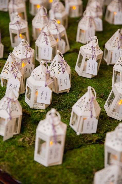 Mini lanterns triple duty: Table lanterns, decor and favors! #Miller2Lyons Lantern Party Favors, Mini Lanterns Wedding, Fairy Wedding Theme, Lantern With Fairy Lights, Lantern Wedding, Lantern Decor Wedding, Table Lanterns, Mini Lanterns, Small Lanterns