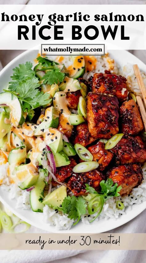 This easy salmon rice bowl recipe features flakey salmon coated in a honey garlic sauce nestled in coconut rice with Asian-inspired toppings. The spicy mayo and coconut rice are what make this salmon bowl stand out from the rest! Did I mention it cooks in 8 minutes? It's one of my favorite healthy recipes! Baked in the air fryer, these salmon bites are glazed to perfection. Use tamari, coconut aminos, or soy sauce in the marinade! Asian Marinated Salmon, Salmon Meal Prep For The Week, Salmon Sticky Rice Bowl, Primal Kitchen Salmon Bowl, Salmon Burger Bowl Recipe, Low Cal Salmon Dinner, Salmon And Cilantro Lime Rice, Coconut Rice Dinner, Gf Df Salmon Recipes