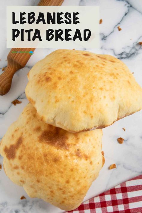 This Lebanese Pita Bread recipe is a delicious, no-fuss way to have an all-around bread for all your meals.  Plus, it's so easy to prepare it manually --- give it a try! Lebanese Bread Recipe, Lebanese Pita Bread Recipe, Easy Pita Bread Recipe, Turkish Flatbread Recipe, Lebanese Bread, Tzatziki Sauce Recipe, Homemade Pita Bread, Pita Bread Recipe, Pita Recipes