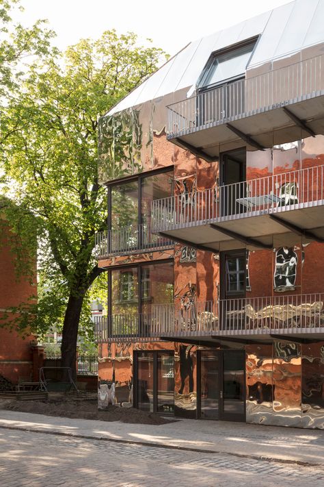 A Cooperative House in Moabit, Berlin, Reflects Its Surroundings—Literally Cooperative Living, Cooperative Housing, Junya Ishigami, Co Housing, Roof Shapes, Stainless Steel Panels, Modern Extension, Exposed Concrete, Brick Building