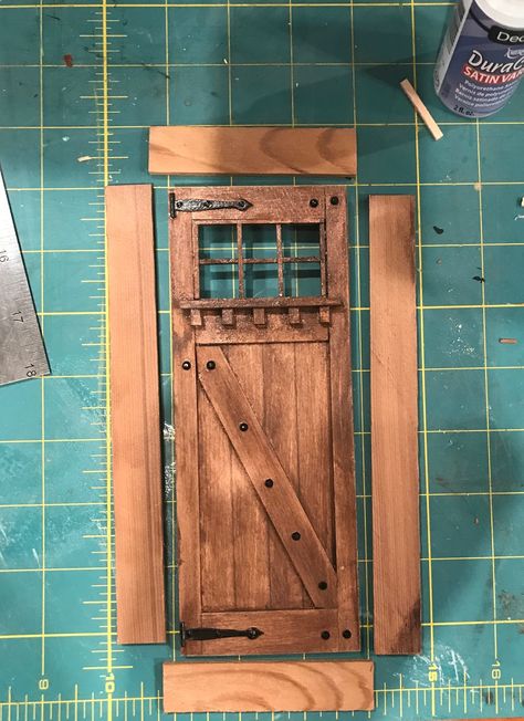 I spent some time building a front door for my cabin project this weekend. I spent a little time, mainly on Pinterest getting some ... Doll House Doors Diy, Doll House Door, Cabin Front Door, Miniature Doors, Cabin Dollhouse, Dollhouse Door, Tiny Stuff, Log Cabin Ideas, Cabin Doors