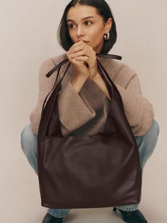 The 2024 Bag Trends Will Make Your Outfits Look So Luxe Slouchy Leather Tote, Uni Bag, Purse Trends, Slouchy Tote, Sustainable Bag, Work Tote, Brown Tote, Trending Handbag, Bag Trends