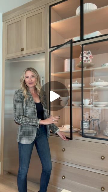 Kelly Griffiths on Instagram: "Save for later: iron glass display cabinets are a timeless addition to any kitchen design! Comment SHOP for links.  LED lighting and hidden hinges are the secret ingredients though and I’ve linked them.   Details: 1. The glass doors have black iron trim. 2. You simply push to open with a magnetic catch at the top. 3. The LED strips are located next to the door hinges and are recessed into the cabinets. They are on one of our kitchen switches. 4. The hinges are on the top and bottom of the doors and only as thick as the cabinet rail. 5. These cabinets are rift sawn white oak.  Follow along for more design details @the_english_modern  Shop this post on my LTK ⬇ https://liketk.it/4Y38w #ltkseasonal #ltkwatchnow #ltkhome  #kitchen #kitchendesign #interiordesignid Upper Glass Kitchen Cabinet Display, Kitchen Glass Cabinets Display Ideas Modern, Glass Door Cabinet Kitchen, Reeded Glass Upper Cabinets, Kitchen Ideas With Glass Cabinets, Glass Wear Cabinet, Black Glass Cabinets Kitchen, Cabinet Door Profiles, What To Put In Glass Kitchen Cabinets