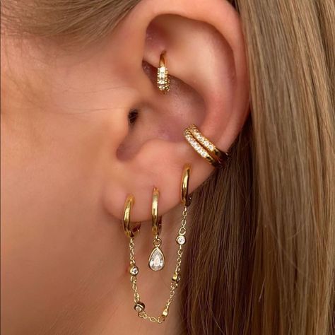 For A Perfect Golden Touch Wear The Double Earring Hoop Embellished By A Delicate Cz Chain. 70mm In Length 14kt Gold Vermilion Sterling Silver These Are Gorgeous Sold For $58 Each Layering Earrings Ideas, Earring Stack Ideas Mixed Metals, Gold Earrings Stacking, Stacked Earrings Silver, Prom Earring Stack, Multiple Gold Earrings, Earring Stack Ideas Gold, Chunky Gold Earrings Stack, 3 Lobe Piercings Ideas Gold